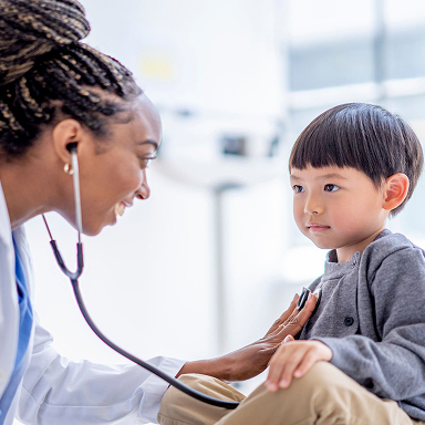 Doctor attending baby